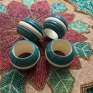 Set of four vintage retro Mcm green and beige napkin ring holders